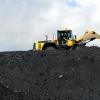 What temperature does coal produce?